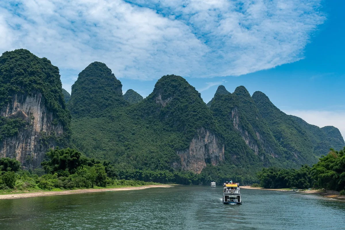 A river journey between Guilin's limestone peaks